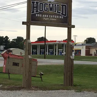 a sign for hog wild bbq