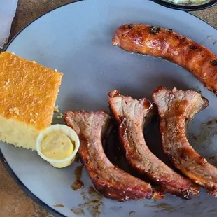 Ribs, bacon cheddar sausage, potato salad, mac &amp; cheese