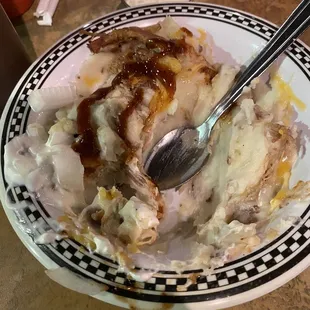 $14.00 bowl of no meat brisket bowl... drier than a Sahara desert..... Biggest garbage meal I ever bought on earth