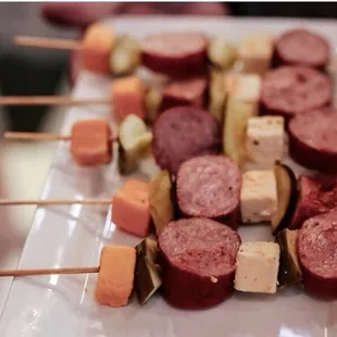 Memphis Style Sausage &amp; Cheese Skewer with Kielbasa, Cheddar Cheese, Pepper Jack Cheese, Pickle and a sprinkle of our hog wild seasoning