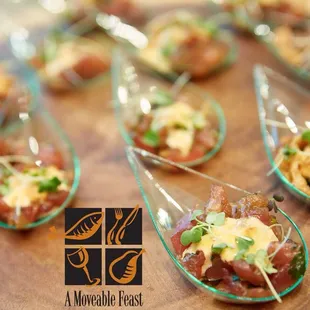 This tuna tartare makes for an impressive passed appetizer at a dinner party. A layer of tuna topped with wasabi mayonnaise &amp; micro greens.
