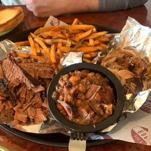 1/2 lb Brisket, 1/2 lb pulled pork , hand cut fries, beans!