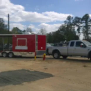 20 foot trailer with full kitchen and 10&apos; porch.