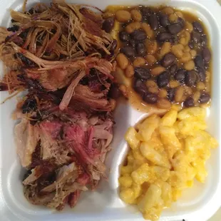 Half pulled pork and brisket. Baked beans and Mac n cheese.
