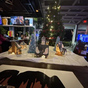 Gorgeous department 56 North Pole series, special edition and rare in collection displayed at the one and only.... Hogg Daddy&apos;s