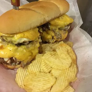 KJ&apos;s ultimate 2 lb burger - 4 1/2lb pattys served with American &amp; Swiss cheese topped with sautéed onions and mushrooms