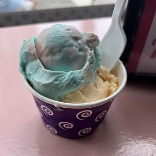 Two scoops: cotton candy and peach ice cream