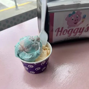 Two scoops: cotton candy and peach ice cream