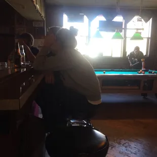 a man sitting at a bar