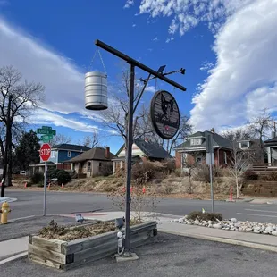 a street corner with a water tower in the background