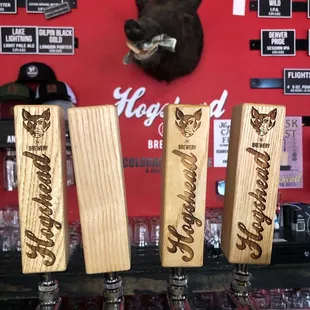 a row of beer taps