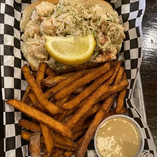 Lobster roll was good sweet potato fries and that sauce were Great