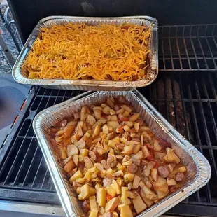 Smoked cheesy taters with onions and peppers and some spices, along with lots of butter