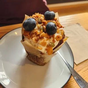 Carrot Cake muffin with a yogurt style topping and fresh blueberries! Delicious!