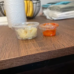 two bowls of food on a table