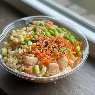 Regular Build Your Own Bowl with brown rice, salmon, albacore, edamame, corn, and pickled carrots