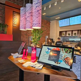 a table with a laptop on it