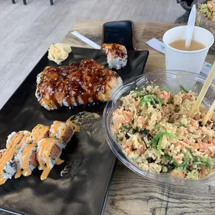 Bottom left going clockwise:  Spicy tuna rolls were Lobster roll Make your own poke bowl with mashed spicy tuna as protein pick.