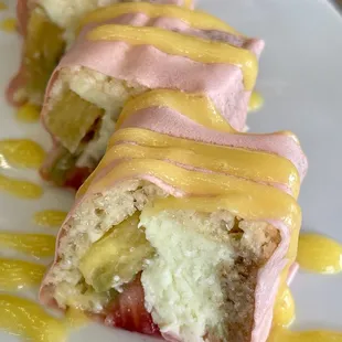 Ninja Fruit Roll for dessert? Yes please!   Strawberry, pineapple, kiwi rice crispy, New York cheesecake with mango sauce in a soy wrapper.