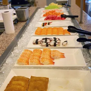 a variety of sushi and rolls