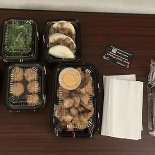 L-R Harumaki, Seaweed Salad, Sesame Balls, Chashu Bun 2 pcs, Chicken Karaage and the niceties of a to-go bag. 22DEC24