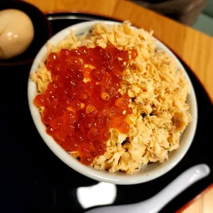 a bowl of ramen and a boiled egg