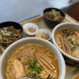 three bowls of ramen and two bowls of soup