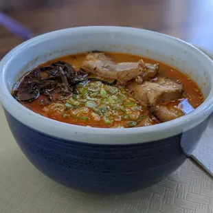 a close up of a bowl of ramen