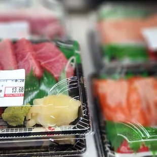 a variety of sashimi items