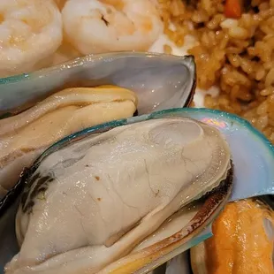 a plate of seafood and rice