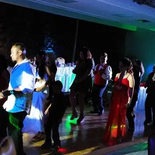 Dancing during a wedding at the Pagoda International Ballroom, April 19, 2014.