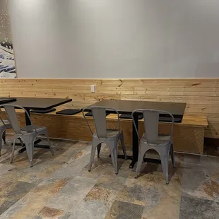 Main seating area. The wood bench has cushions for comfort