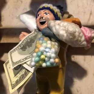 Adorable decor. Can anyone explain this custom to me? Is there a name for this doll?