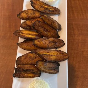 a plate of fried plantains and dip