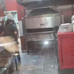 a man standing in a kitchen