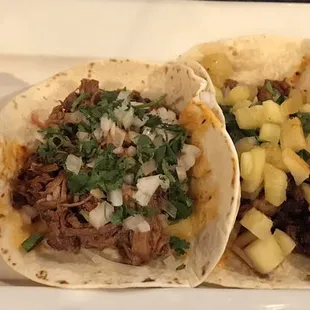 Tacos for lunch - one barbacoa and one al pastor - with flour tortillas, rice and beans.