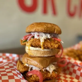 a stack of fried chicken sandwiches