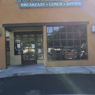 front door, sign, and entrance.