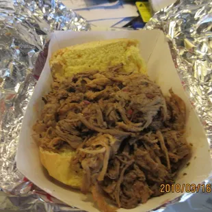 BBQ Sandwich as it was packaged, open faced on a White House Roll.