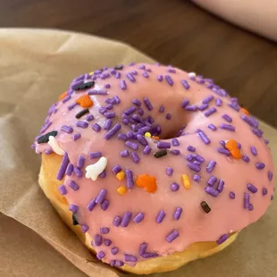 Strawberry frosted donut with Halloween sprinkles!