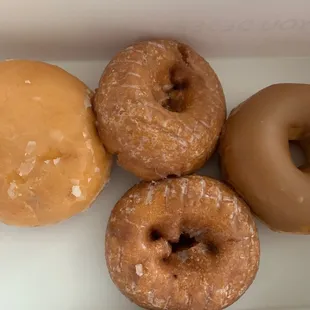 (Left to right) strawberry filled, two pumpkin (seasonal), maple glazed
