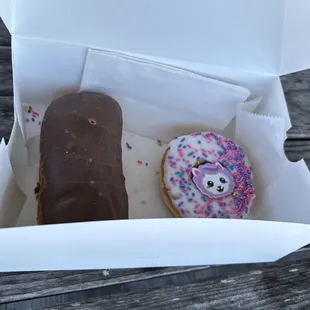 Giant eclair and a sprinkle donut with a ring