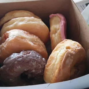 A mixed half dozen of donuts. Super soft and fluffy. Delicious.