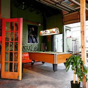 a pool table in a garage