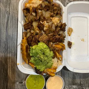 Carne Asada Fries with green salsa
