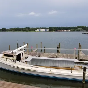 a boat docked at a dock