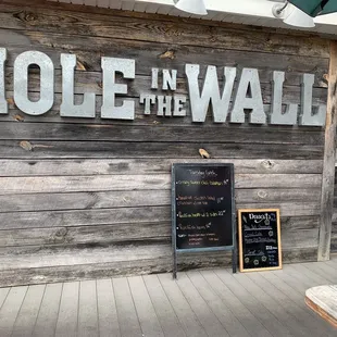 a sign for hole in the wall