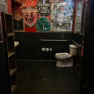 a toilet in a stall