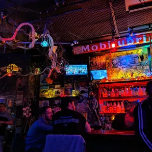 people sitting at a bar
