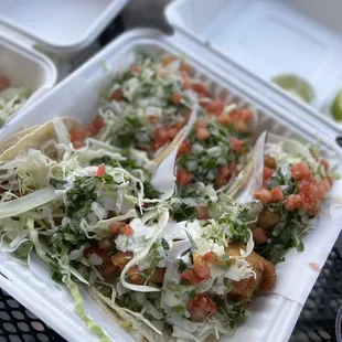 tacos in a styrofoam container
